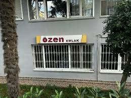 Özen Emlak logo