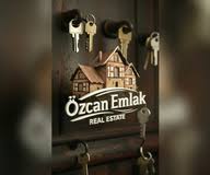 ÖZCAN EMLAK logo